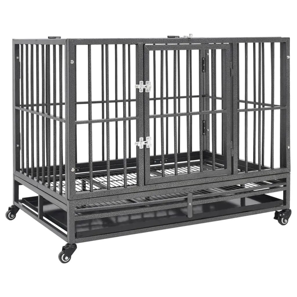 Black steel dog crate with hinged front door, removable tray and four caster wheels, angled view on white background