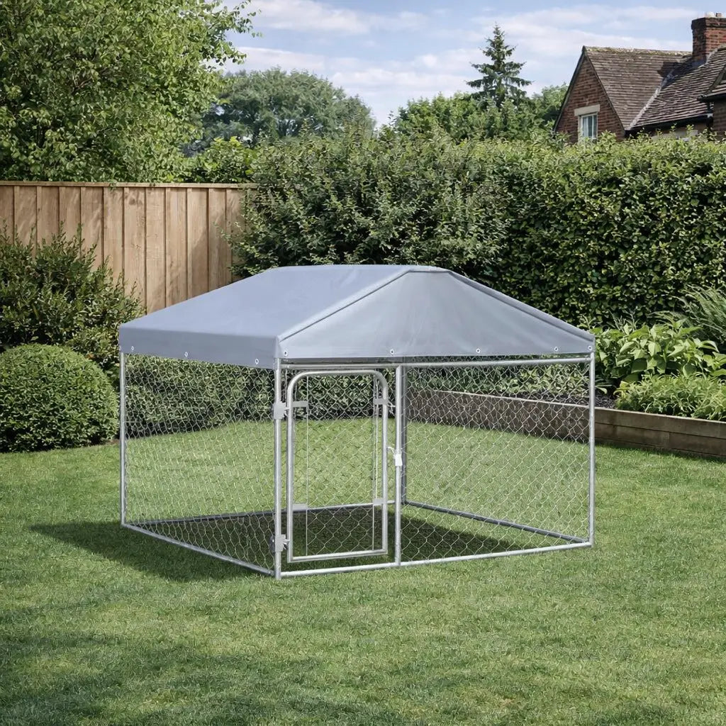 Outdoor dog kennel with roof canopy, galvanised steel frame and chain-link mesh side panels installed outdoors
