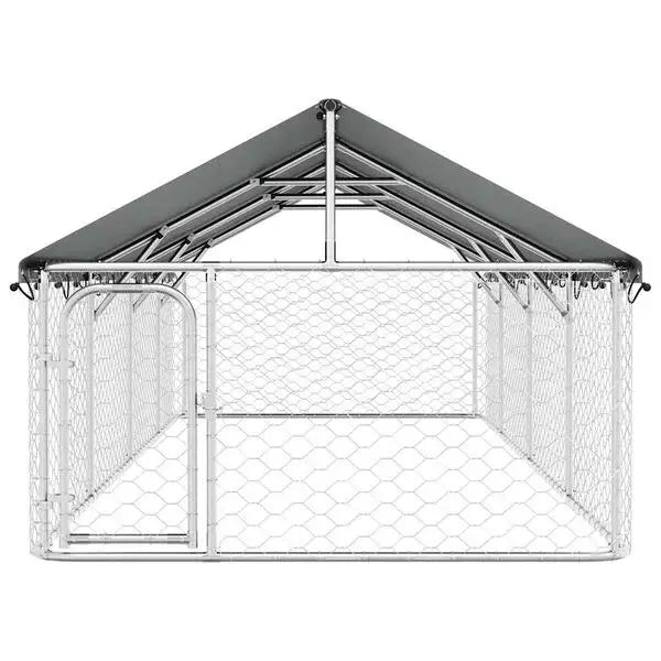 Front view of galvanised steel dog kennel with pitched roof cover and hinged lockable door