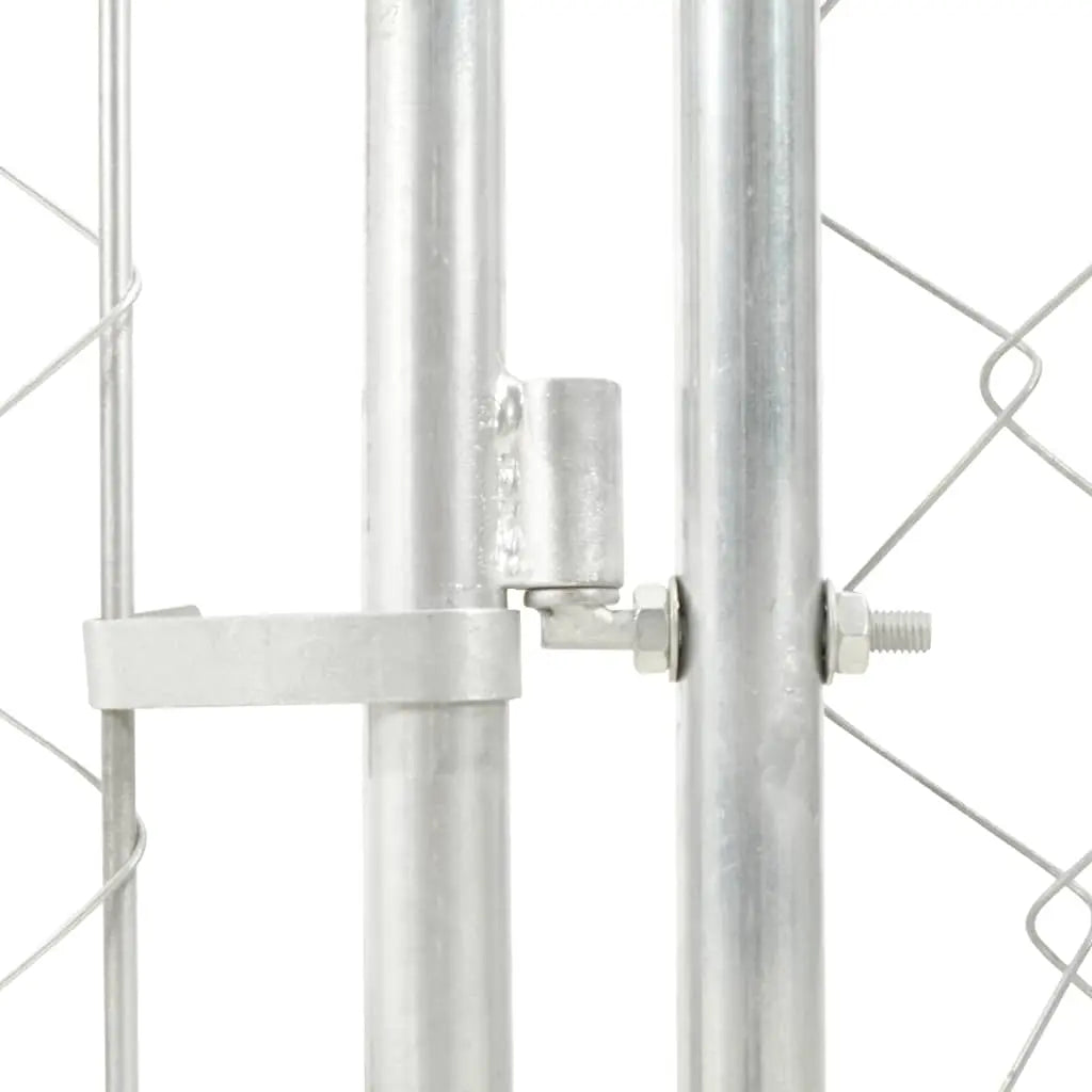 Detail of galvanised steel frame connection with chain-link mesh side panel on outdoor dog kennel