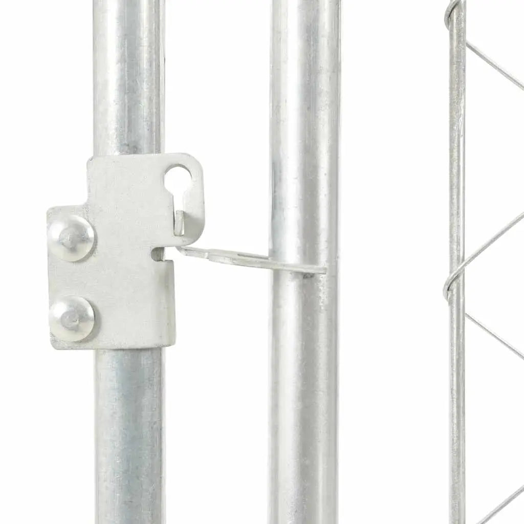 Detail of galvanised steel frame connection on outdoor dog kennel with chain-link mesh side panel
