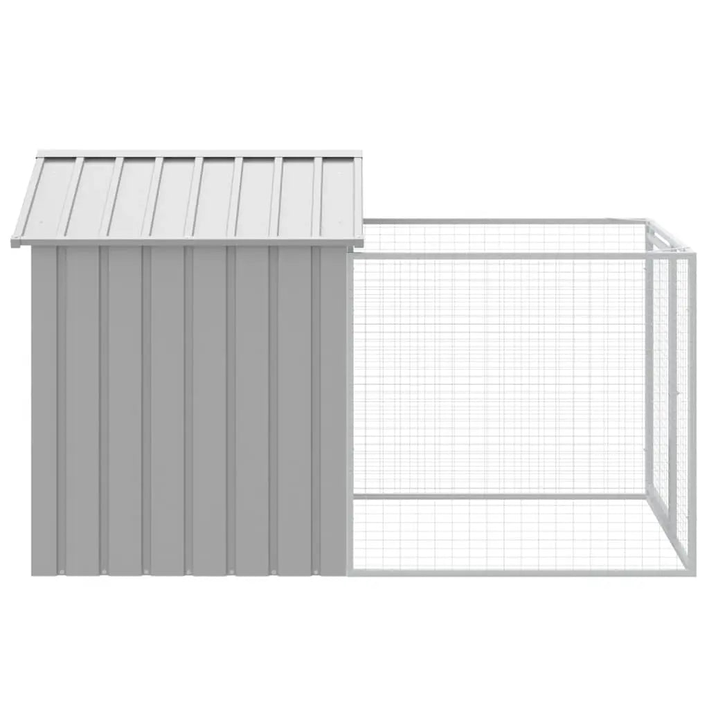 Side view of galvanised steel dog kennel showing enclosed shelter section and adjacent mesh run