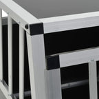 Close-up of aluminium frame and black plastic corner connectors on single door car dog crate