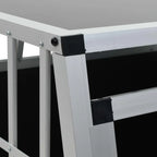 Close-up detail of aluminium frame corner with black plastic connectors on car dog crate