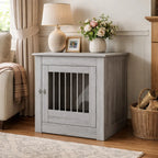 Grey Sonoma dog crate furniture styled as a side table in a living room interior setting